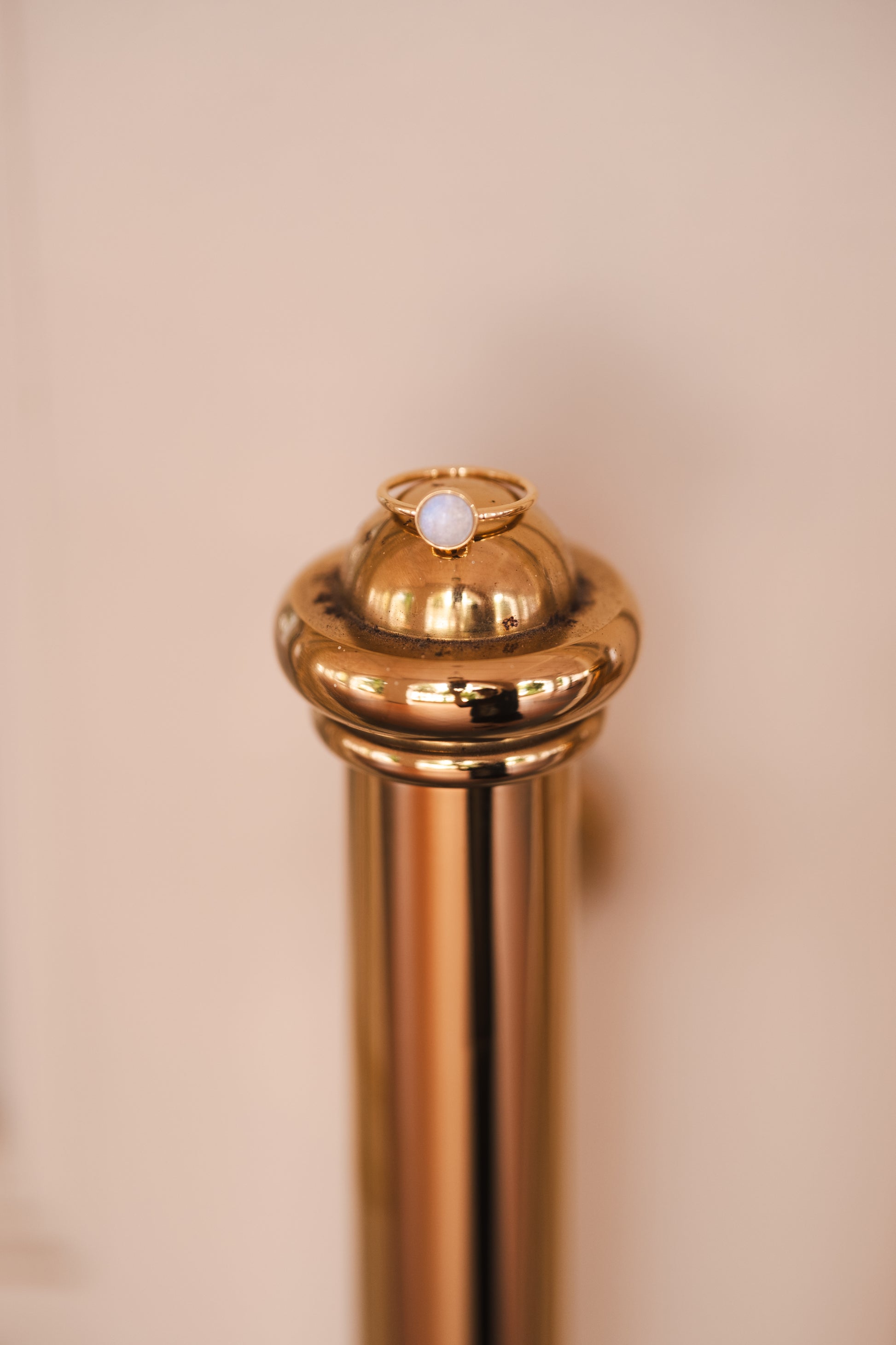 Solid gold Origin ring holding a preserved breastmilk stone
