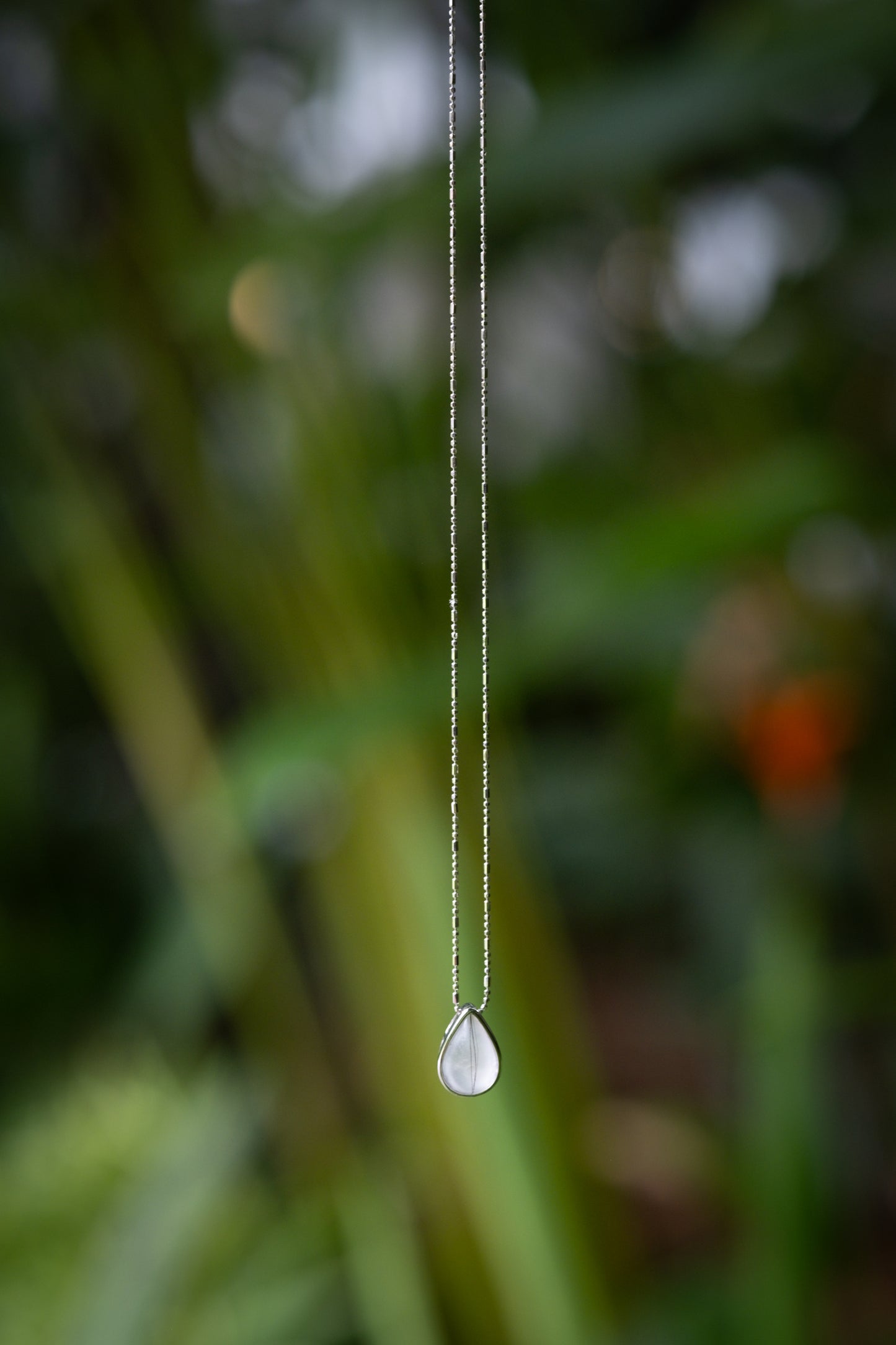 Dewdrop solid gold breastmilk necklace, a tender everyday keepsake