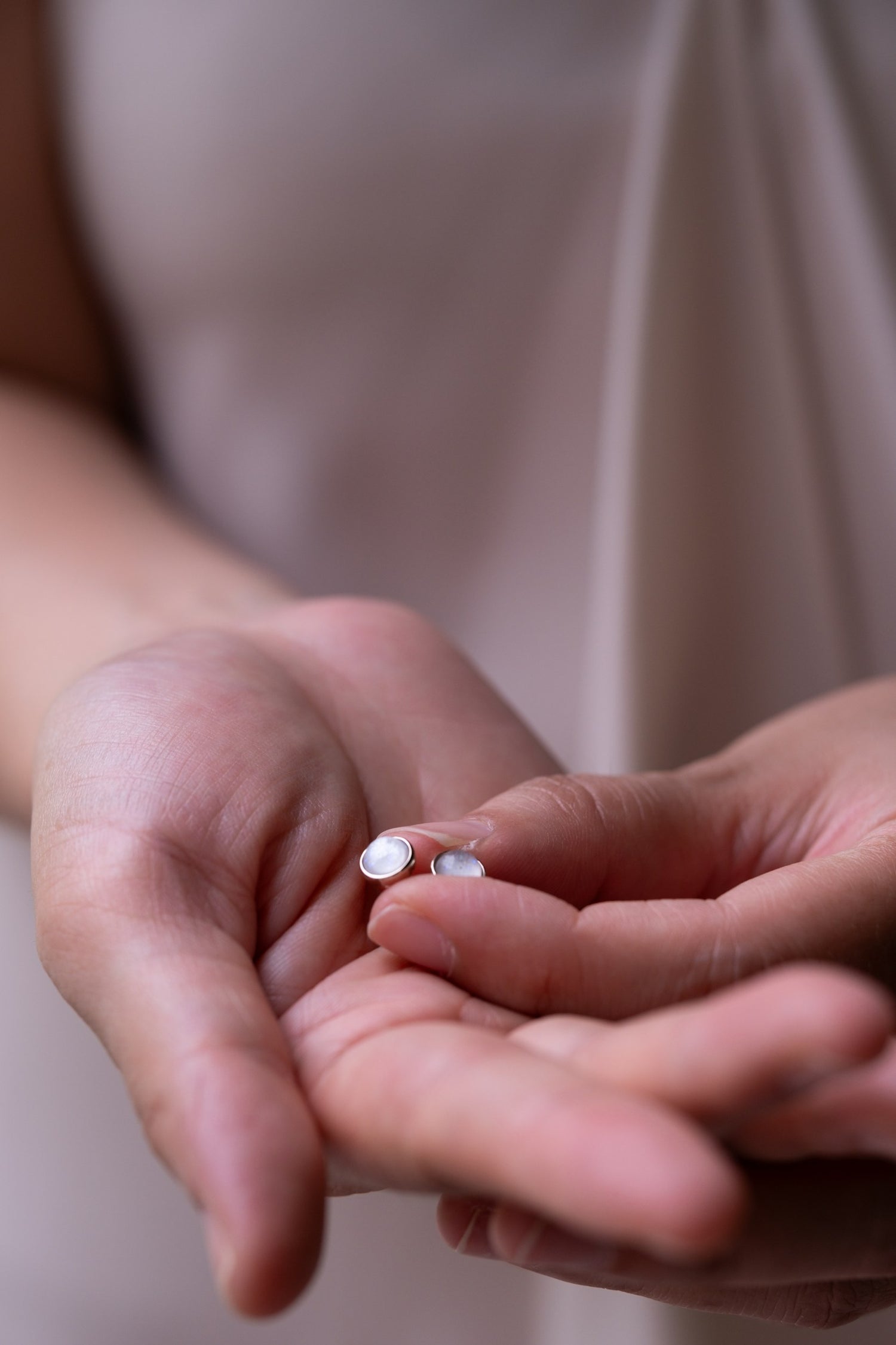 Breastmilk stud earrings in solid gold, a subtle keepsake of your breastfeeding journey
